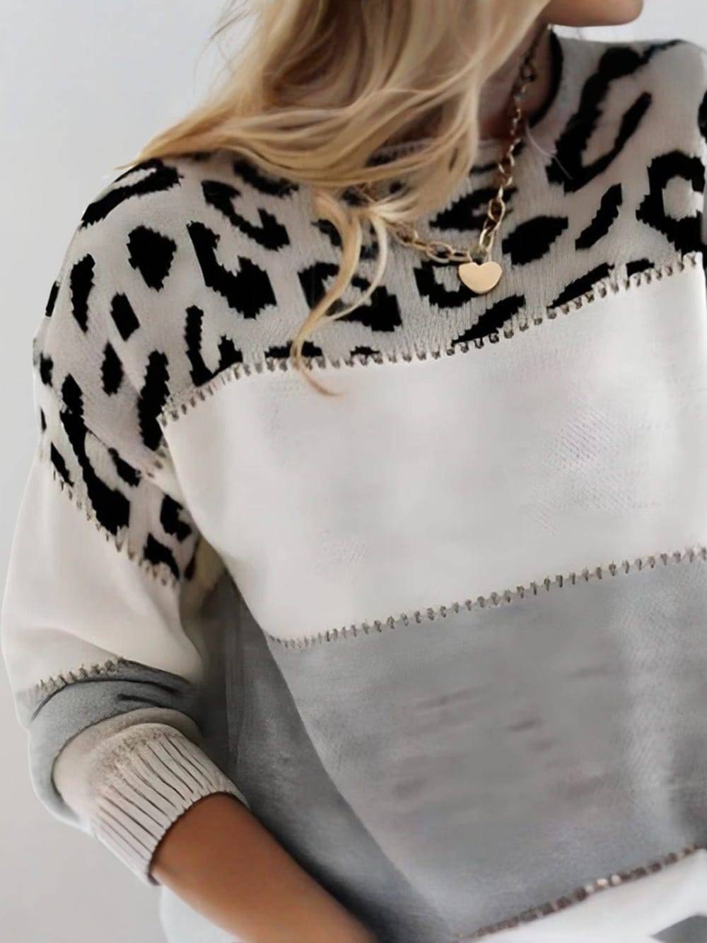 LEONIE | Animal Print Sweater" 

Rewritten Title: "LEONIE | Wild Animal Print Sweater